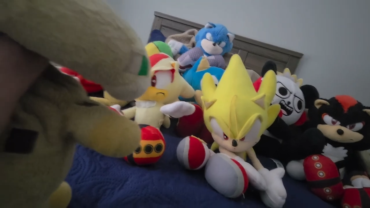 Group of plush characters gathered together