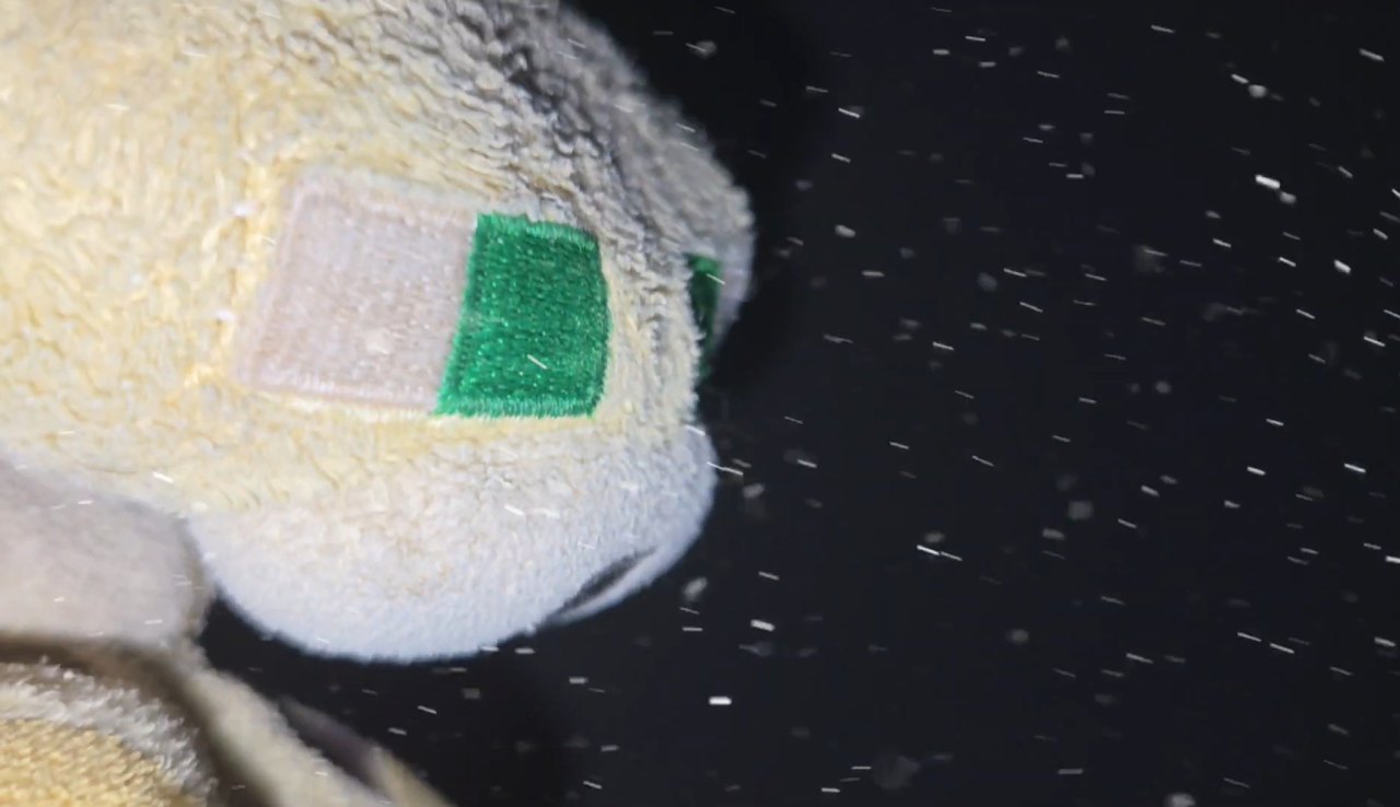 White plush character in the dark